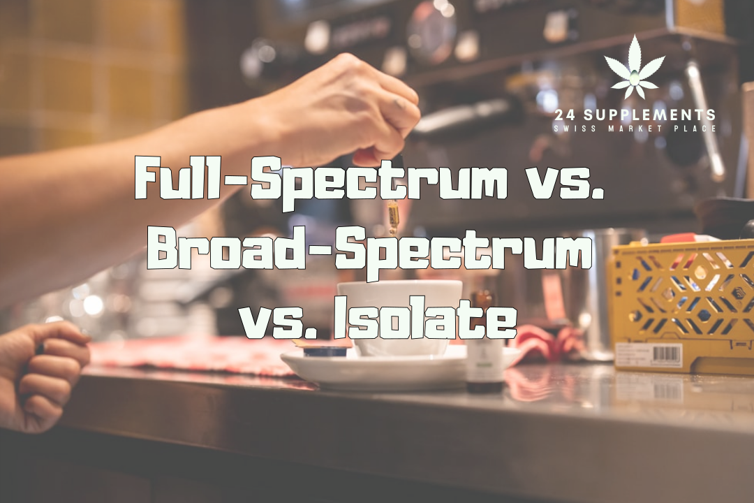 Three bottles of CBD oil labeled full-spectrum, broad-spectrum, and isolate displayed on a wooden table, representing the different types of CBD oils available at 24Supplements.